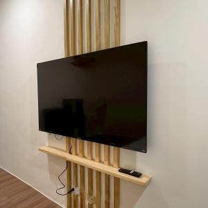 TV a/nebo společenská místnost v ubytování Yunshanjian B&B