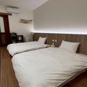 Postel nebo postele na pokoji v ubytování Yunshanjian B&B