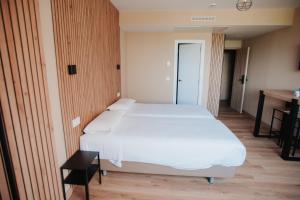 Postel nebo postele na pokoji v ubytování Polotel