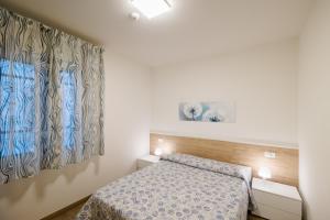 Ένα ή περισσότερα κρεβάτια σε δωμάτιο στο Bungalow bei Emma