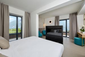 Postel nebo postele na pokoji v ubytování Hotel Royal Village