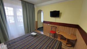 TV a/nebo společenská místnost v ubytování Hotel Desna KUT