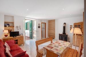 Μια τηλεόραση ή/και κέντρο ψυχαγωγίας στο Casa Vacanze Mare E Limoni