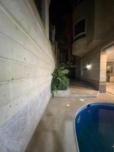 Bazén v ubytování Private Pool Suite nebo v jeho okolí