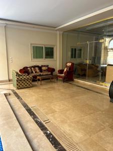 Posezení v ubytování Private Pool Suite