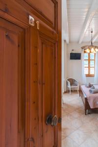 Postel nebo postele na pokoji v ubytování Authentic Suites in Fiscardo (Archontiko)