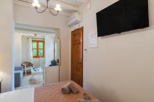 TV a/nebo společenská místnost v ubytování Authentic Suites in Fiscardo (Archontiko)