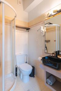Koupelna v ubytování Authentic Suites in Fiscardo (Archontiko)