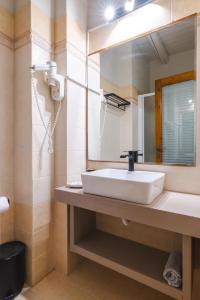 Koupelna v ubytování Authentic Suites in Fiscardo (Archontiko)