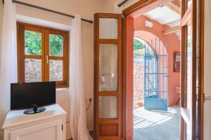 TV a/nebo společenská místnost v ubytování Authentic Suites in Fiscardo (Archontiko)