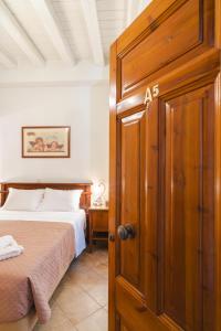 Postel nebo postele na pokoji v ubytování Authentic Suites in Fiscardo (Archontiko)