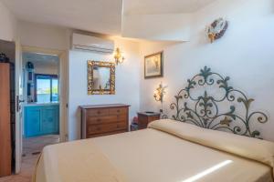Posteľ alebo postele v izbe v ubytovaní La Terrazza sul mare