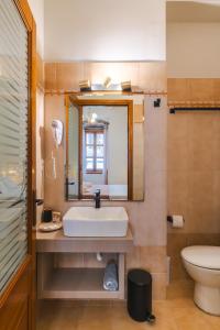 Koupelna v ubytování Authentic Suites in Fiscardo (Archontiko)