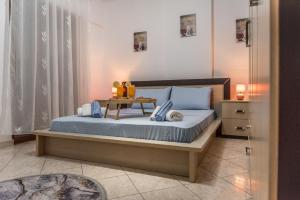 Postel nebo postele na pokoji v ubytování Aria Seaside Tranquility Apartments