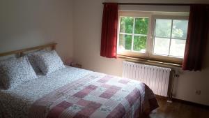 Postel nebo postele na pokoji v ubytování B&B Le Bois de Champia