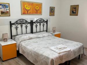 Ένα ή περισσότερα κρεβάτια σε δωμάτιο στο Il Petalo di Cristallo