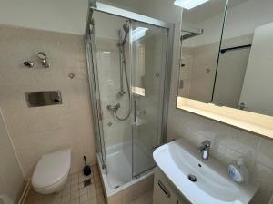 Ένα μπάνιο στο Zentral gelegenes Apartment für Ihren Urlaub in Bad Reichenhall