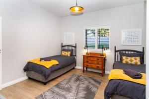 Ένα ή περισσότερα κρεβάτια σε δωμάτιο στο Vygeboom Villa/ Durbanville