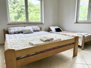 Postel nebo postele na pokoji v ubytování Anit Rooms + 2 fotografie