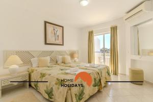 Ένα ή περισσότερα κρεβάτια σε δωμάτιο στο #315 Apartamento Turistico by Home Holidays