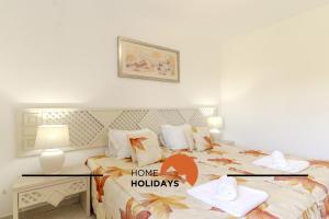 Ένα ή περισσότερα κρεβάτια σε δωμάτιο στο #315 Apartamento Turistico by Home Holidays