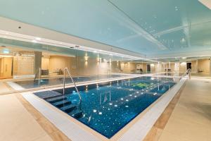 a large swimming pool in a large building at King david residence #102 Near Mamilla, luxurious in Jerusalem