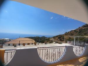a view of a balcony with a view of a roof at Villa Klaus in Lukovë +17 photos