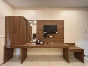 TV a/nebo společenská místnost v ubytování Hotel Saesha International