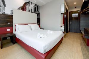 Postel nebo postele na pokoji v ubytování B&B Hotel Trento