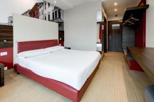 Postel nebo postele na pokoji v ubytování B&B Hotel Trento