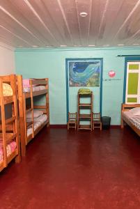 Postel nebo postele na pokoji v ubytování Gîte d'étape Lamandoze