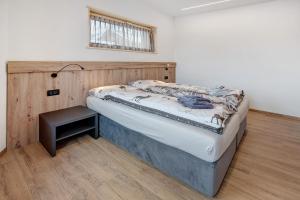 Postel nebo postele na pokoji v ubytování Chalet Kb