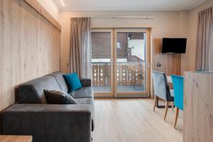 TV a/nebo společenská místnost v ubytování Chalet Kb