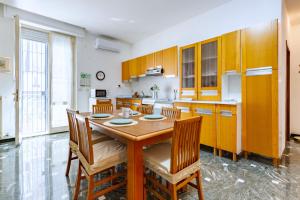 Η κουζίνα ή μικρή κουζίνα στο Appartamento D'Annunzio - MyHo Casa