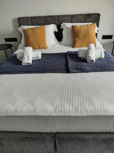 Letto o letti in una camera di HOTEL ANDREAS