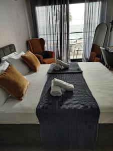 Letto o letti in una camera di HOTEL ANDREAS