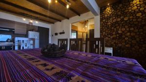 Postel nebo postele na pokoji v ubytování Cabañas Mirador Rakhem