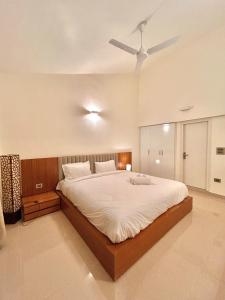 Ένα ή περισσότερα κρεβάτια σε δωμάτιο στο Stunning 3BHK Villa, Mussoorie