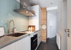 Η κουζίνα ή μικρή κουζίνα στο Seehaus Allensbach - Seerosen Suite +17 φωτογραφίες