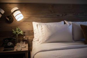 Postel nebo postele na pokoji v ubytování The Wisconsin Hotel & Conference Center + 5 fotografií