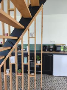 Kuchyňa alebo kuchynka v ubytovaní Jolie Maison en Bord de Mer à Pourville