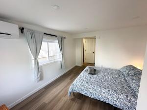 Postel nebo postele na pokoji v ubytování Stylish 2BR - EWR, Stadium & NYC