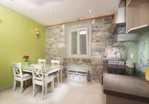 Kuchyň nebo kuchyňský kout v ubytování Desiderata Studio Apartment
