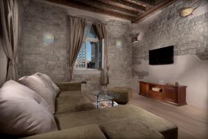 Posezení v ubytování Desiderata Studio Apartment