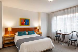 Postel nebo postele na pokoji v ubytování Hotel El Campin