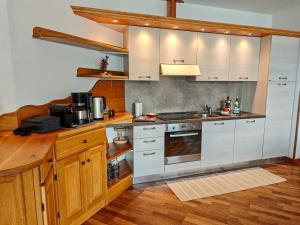 A kitchen or kitchenette at Torretta - Ferienwohnung (SP)