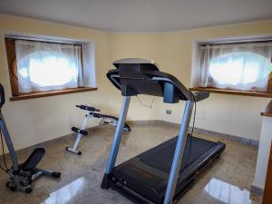 The fitness centre and/or fitness facilities at Torretta - Ferienwohnung (SP)