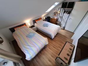 Ένα ή περισσότερα κρεβάτια σε δωμάτιο στο Penthouse Panoramablick Rosie - Monteure Willkommen!