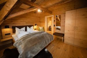 Postel nebo postele na pokoji v ubytování Schwarzwald Chalet -Wilde Rench-