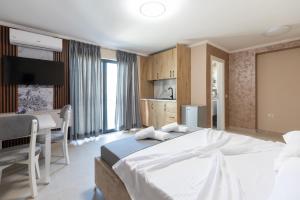 Postel nebo postele na pokoji v ubytování Hotel Apart Resilient + 204 fotografií